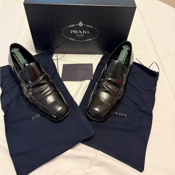 Prada Men's Sleek Black Leather Slip-Ons - Picture 1 of 11